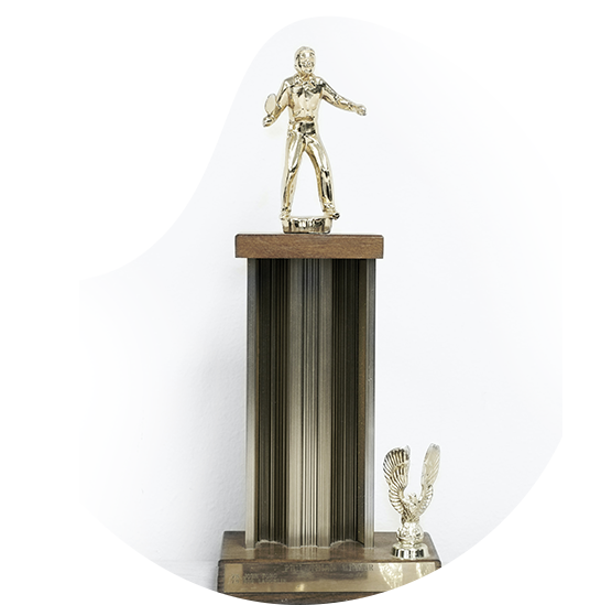 A trophy with person statue